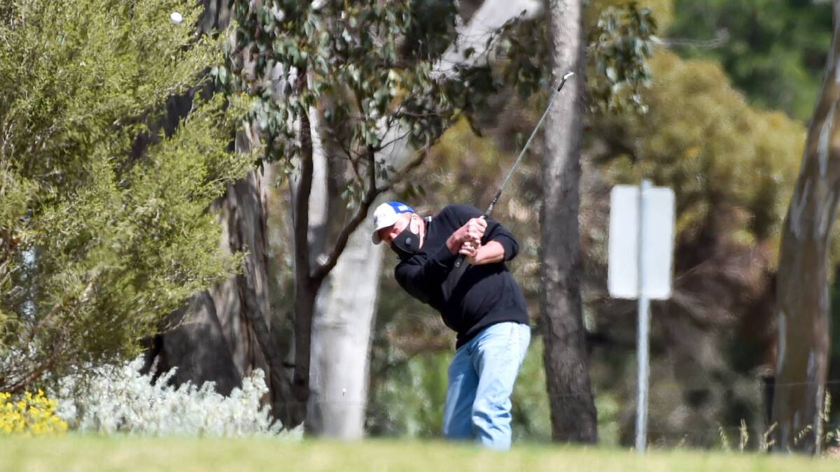IRON SWING: Ray Hercus makes a solid iron shot on Saturday afternoon at Marong during the second round of the club's championship series. Picture: DARREN HOWE