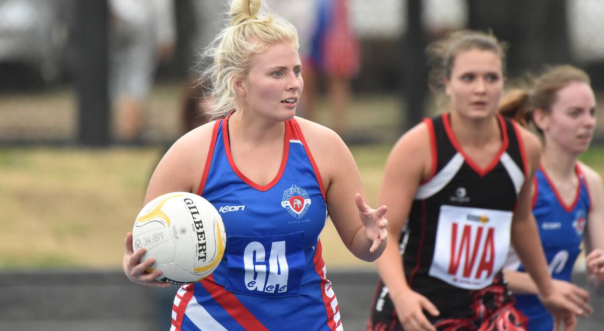 CLOSE CONTEST: North Bendigo's Phoebe Bett looks for an open opportunity during the match against Heathcote.