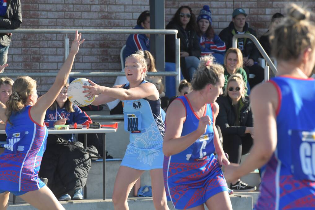 FLYING HIGH: Eaglehawk's wing attack Bridget Murray looks for options during the team's one-goal win over Gisborne. Picture: NONI HYETT