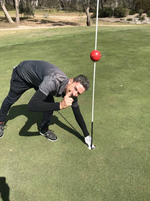 IN THE HOLE: With his trusty 8-Iron in hand, Axedale golfer Drew Drummond made his third hole-in-one on the weekend during the club's weekly competition.