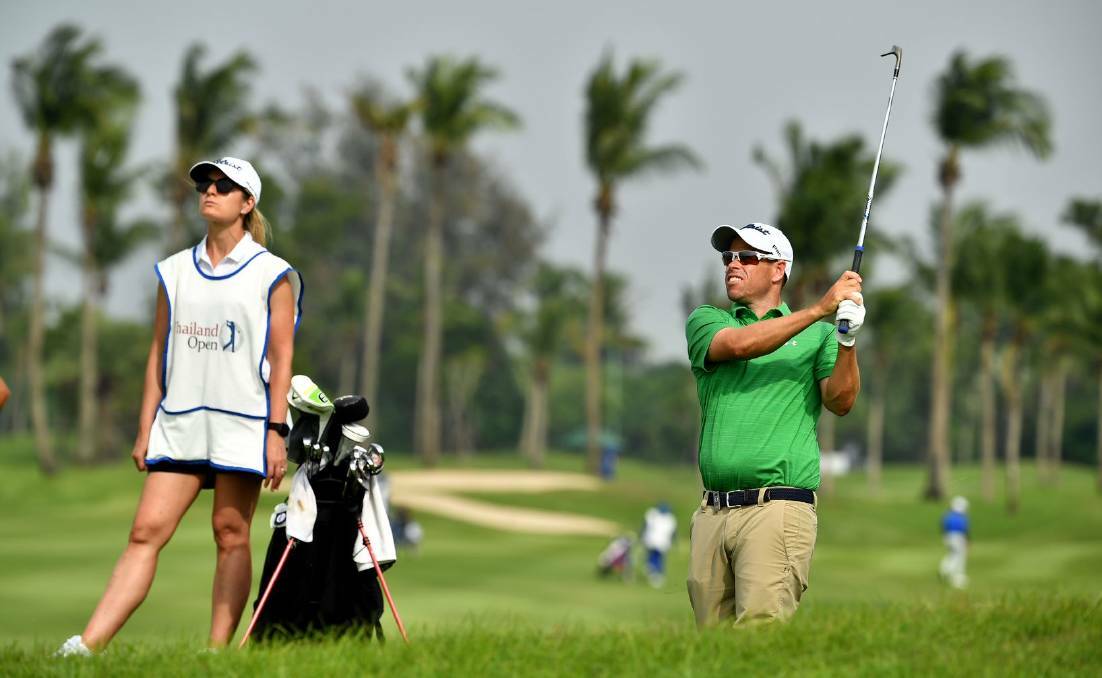 TEAM EFFORT: Andrew Martin with wife Rachel as caddie at the Thailand Open. Picture: ASIAN TOUR