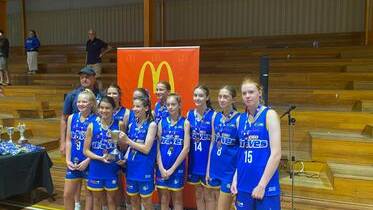 Braves (Under-14 Girls Championship) celebrate after defeating Ballarat in the grand final on Saturday night. Picture supplied