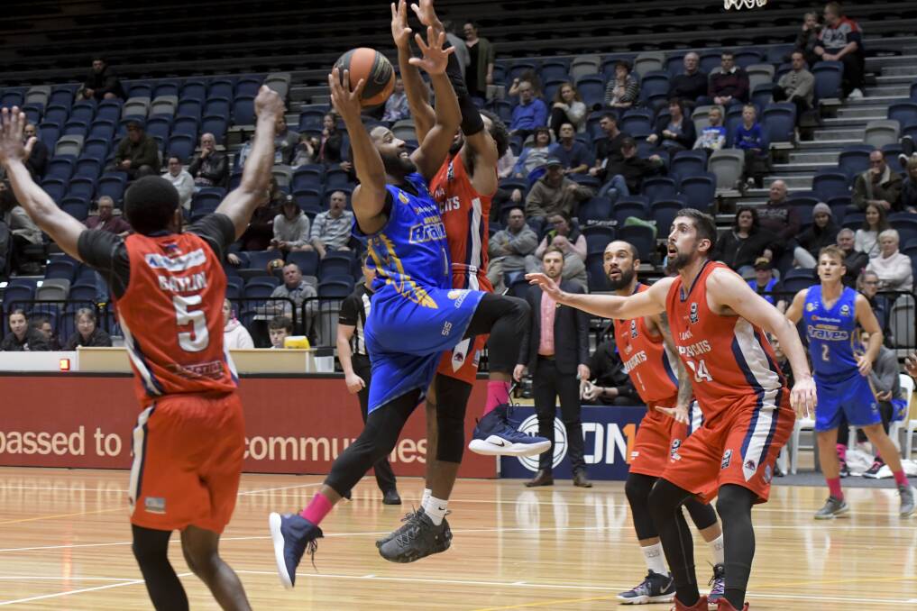 BRAVE BURTON: American import Deonte Burton in action during the Braves men's 16-point win over the Geelong Supercats on Sunday afternoon. Picture: NONI HYETT