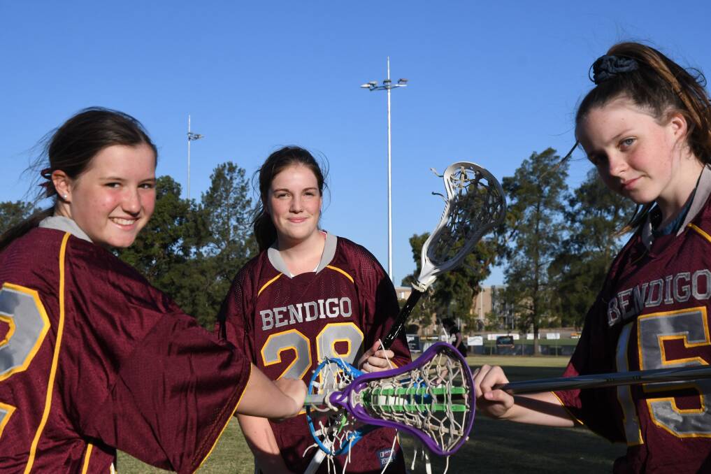FACE OFF: Bendigo Lacrosse Association players Abigail O'Sullivan, Abbey Saxon and Morgan O'Meara.
