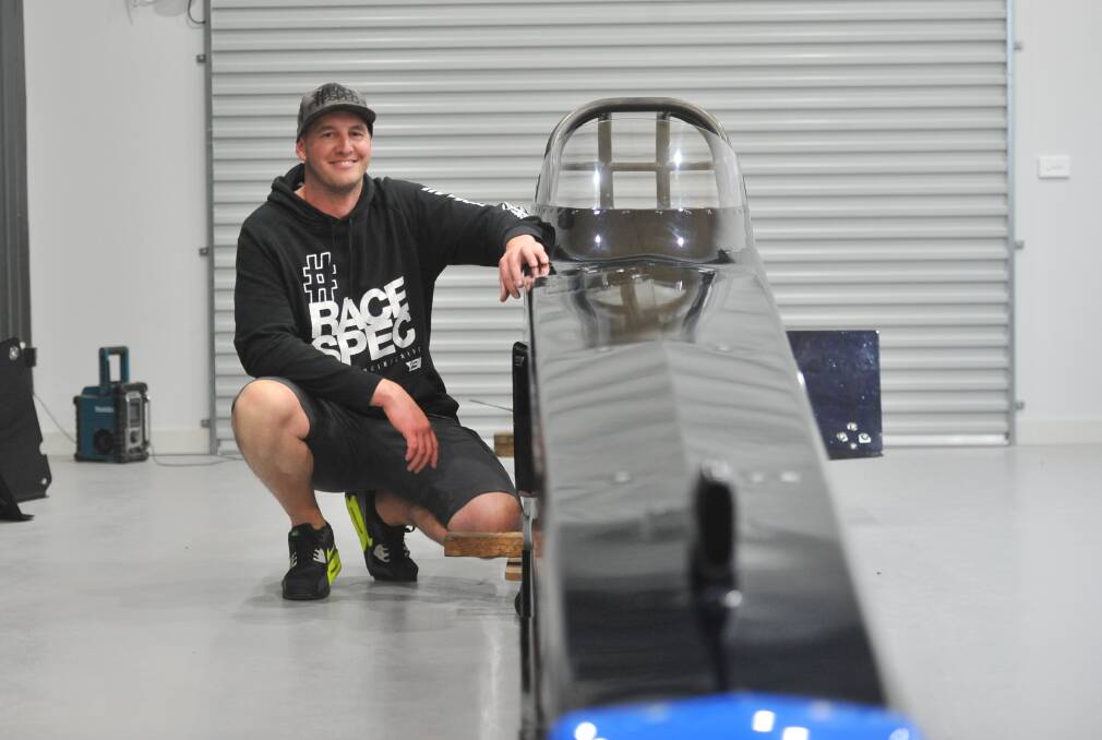 LOCAL TALENT: YBI Creative is making a name for itself on the international motorsport scene. The crew is currently designing and wrapping the chassis of international dragster racer Richie Crampton. Picture: ANTHONY PINDA