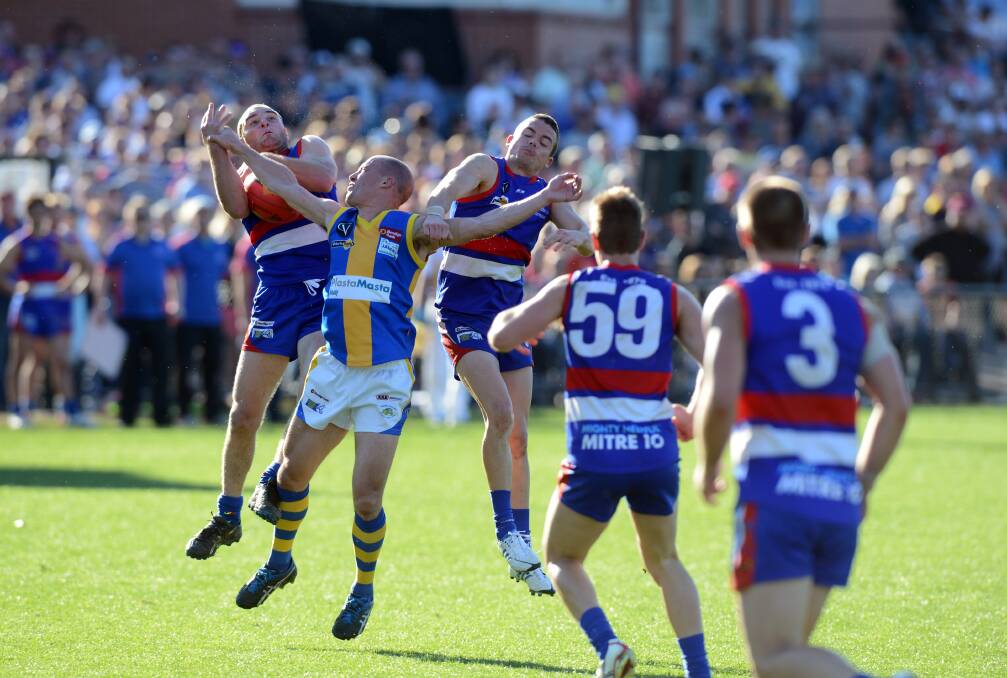 HISTORIC FLASHBACK: The 2012 grand final between Gisborne and Golden Square will always remain as one of the league's most memorable matches. Picture: JIM ALDERSEY