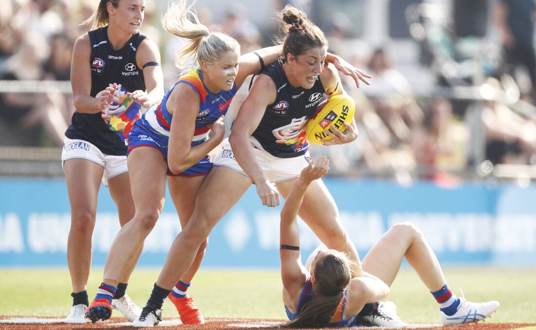 NO DAMAGE: Kerryn Harrington avoided structural damage after suffering a fourth quarter shoulder injury during Carlton's preliminary final win against Fremantle. Picture: AAP/DANIEL POCKETT
