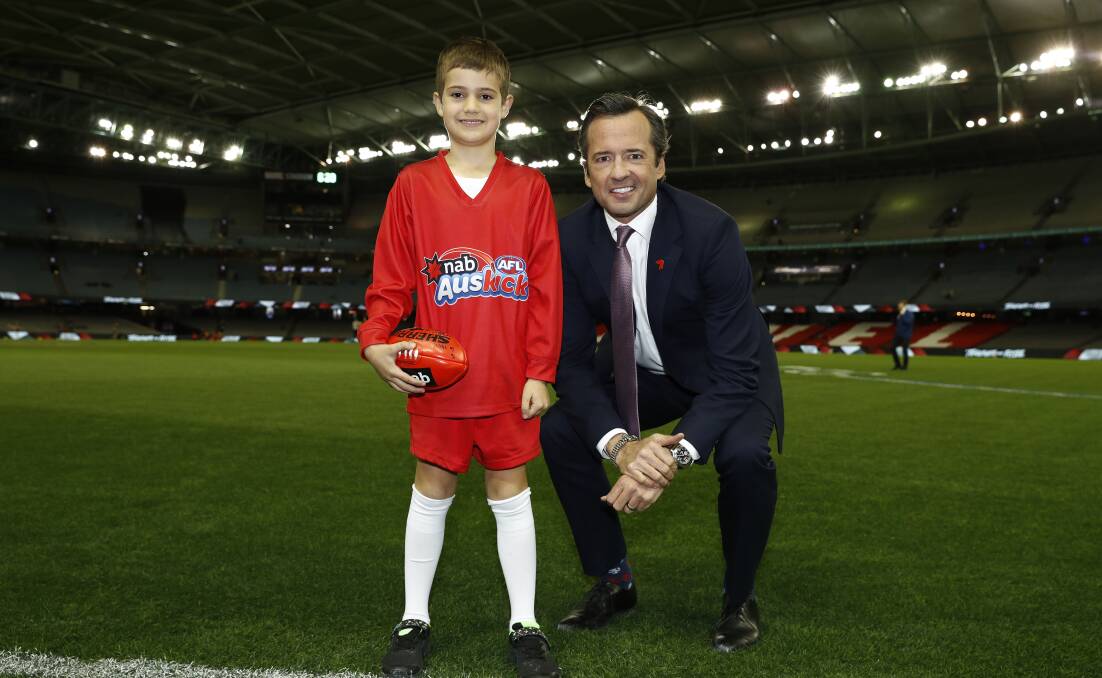 STAR OF THE SHOW: Lennon Clarke, 7, was named as the round nine Auskicker of the Year nominee live on air with Hamish McLachlan. Picture: AFL MEDIA