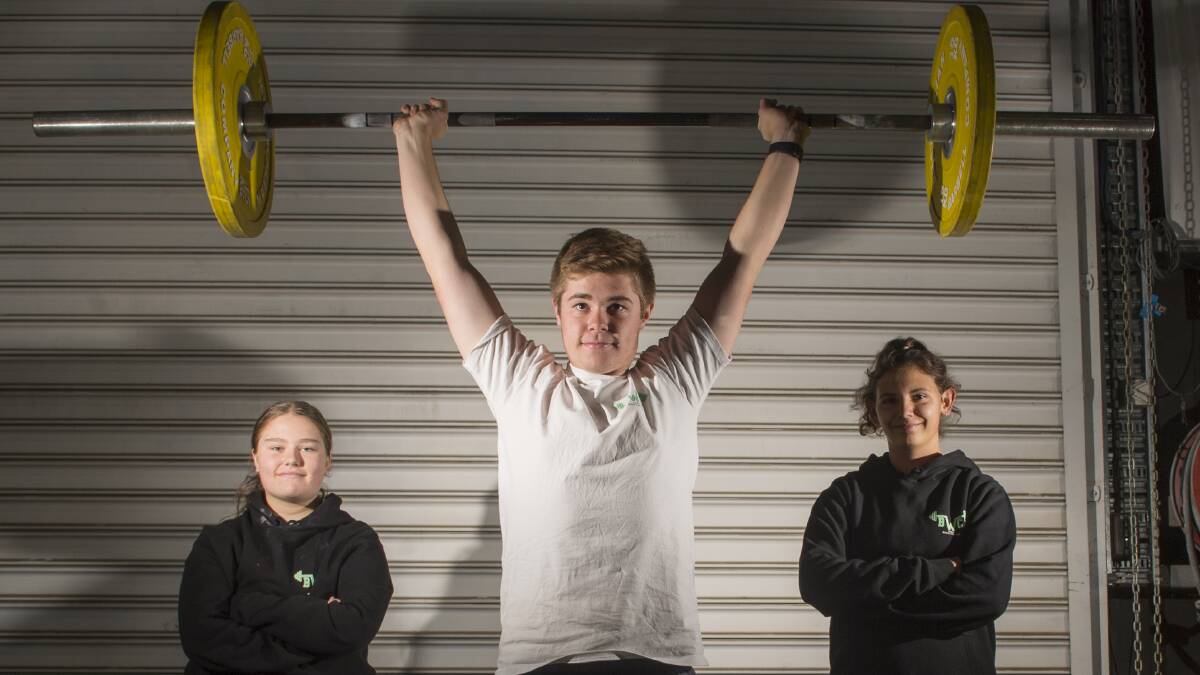 BENDIGO LIFTERS: Carly Whalen, Hayden Trew and Taylah Boston are trained under the guidance of weightlifting coach Troy Hewkins. Picture: DARREN HOWE