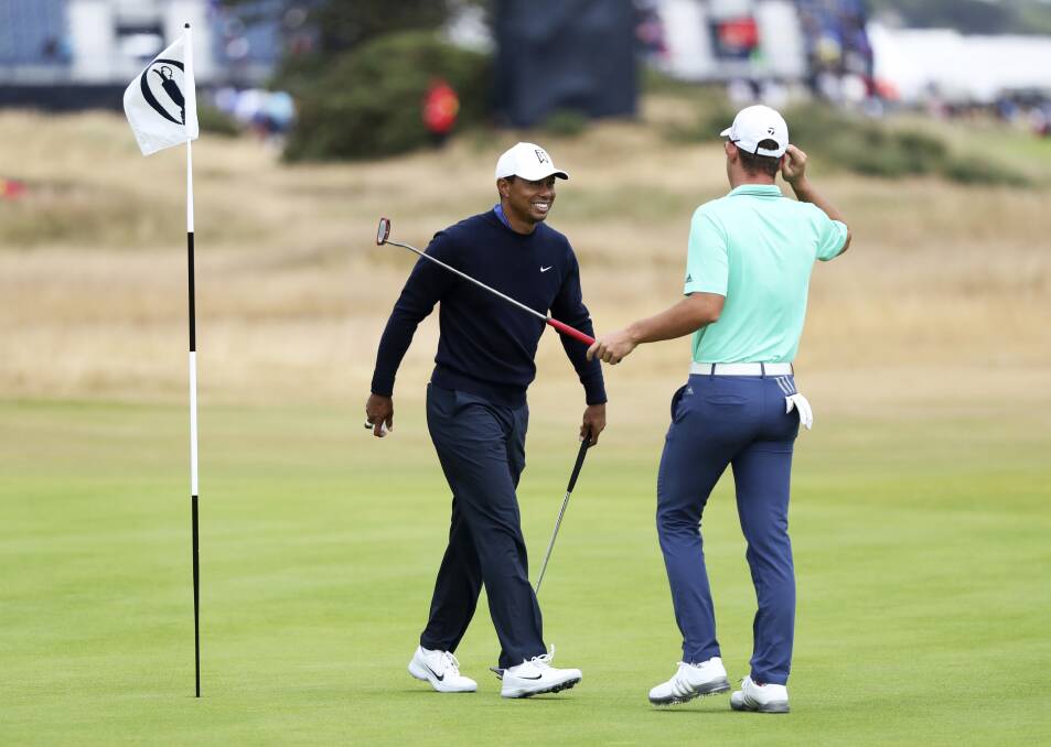 Tiger Woods and Lucas Herbert during a practice round at 147th Open Championship at Carnoustie. PICTURE: AAP IMAGE/David Moir)