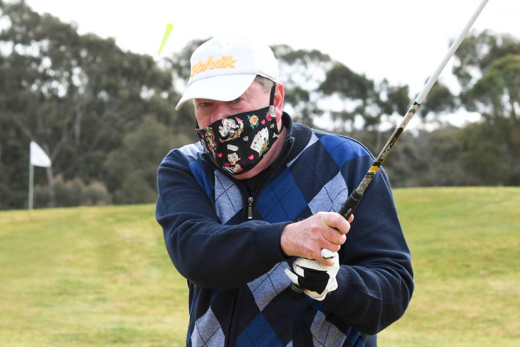 MASK ON: Neangar Park member Phil Masterson donned a mask for a round of golf on Thursday. Picture: NONI HYETT