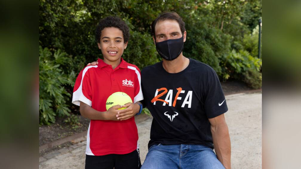 DREAM MEET: Bendigo South Tennis Club junior Isaiah Mbani embraced a once in a lifetime opportunity on Monday when he met his tennis idol Rafael Nadal. Picture: TENNIS AUSTRALIA