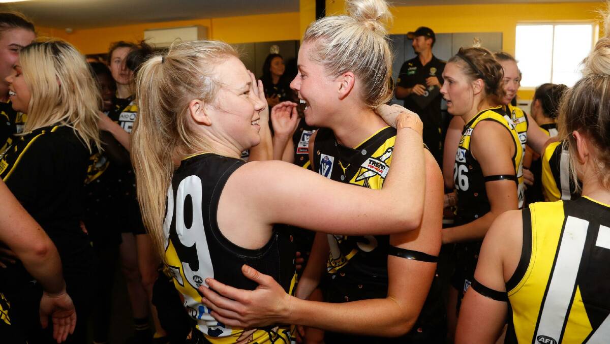 Jacques celebrates with teammates following a win in the VFLW.