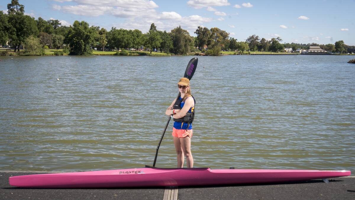 Ashlee Ilott practices her techniques on the water at Bendigo's Lake Weeroona. Picture: DARREN HOWE