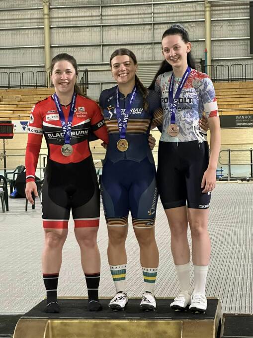 Alessia McCaig (centre) finished the AusCycling Victorian Track Championship weekend with double gold medals. Picture supplied