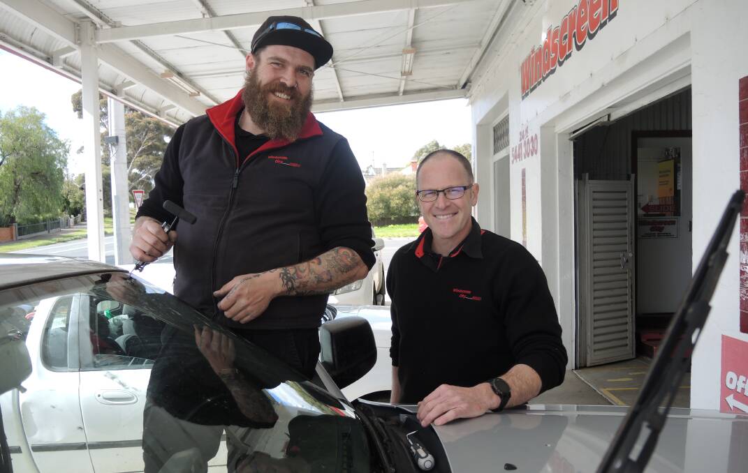 NEW CAREER: Marty Downes with Windscreen City owner Shane Allan. Picture: ANTHONY PINDA