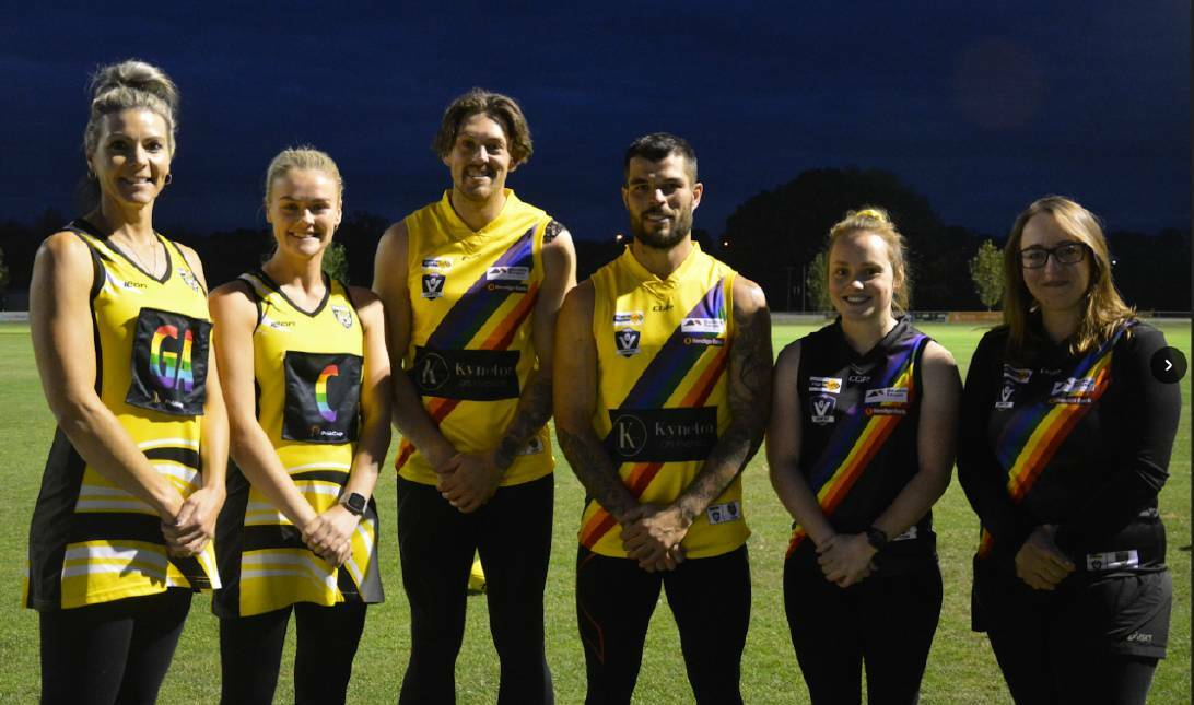 IMPORTANT MESSAGE: Kyneton footballers and netballers with their Pride Cup uniforms ahead of the match held in May this year. Picture: CONTRIBUTED