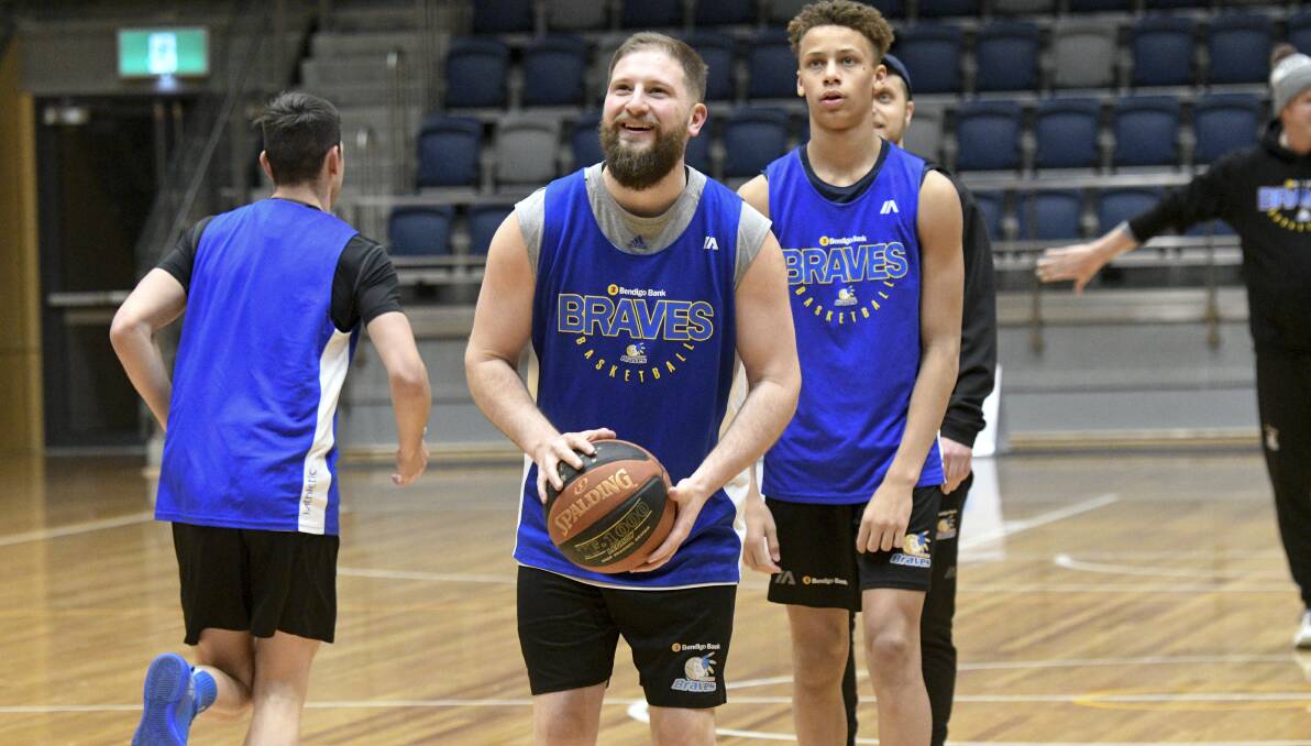 FINAL SESSION: Daniel Hansen lines up a shot during the Braves' last training session before the NBL1 Championship match against the Nunawading Spectres. Picture: NONI HYETT