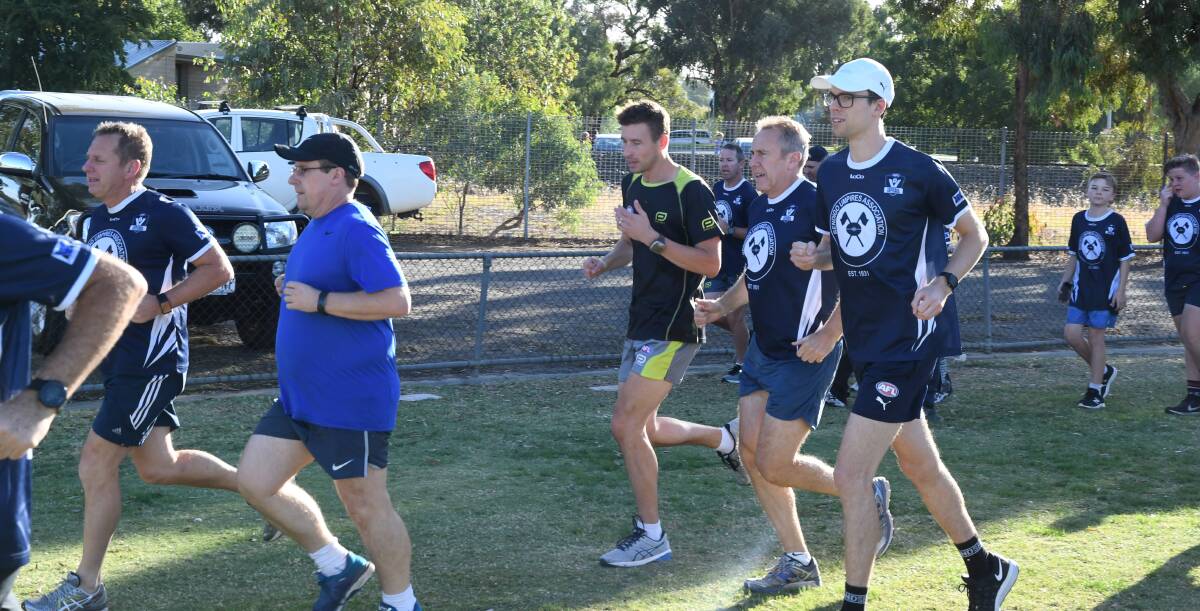 Tim Lougoon running laps at the BUA training session. Picture: ANTHONY PINDA