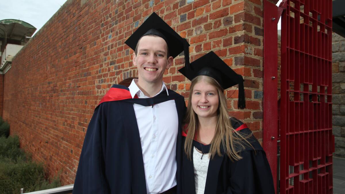 TOGETHER: Austin Wiltshire and Ashleigh Trounson before their graduation ceremony on Thursday afternoon. Picture: GLENN DANIELS