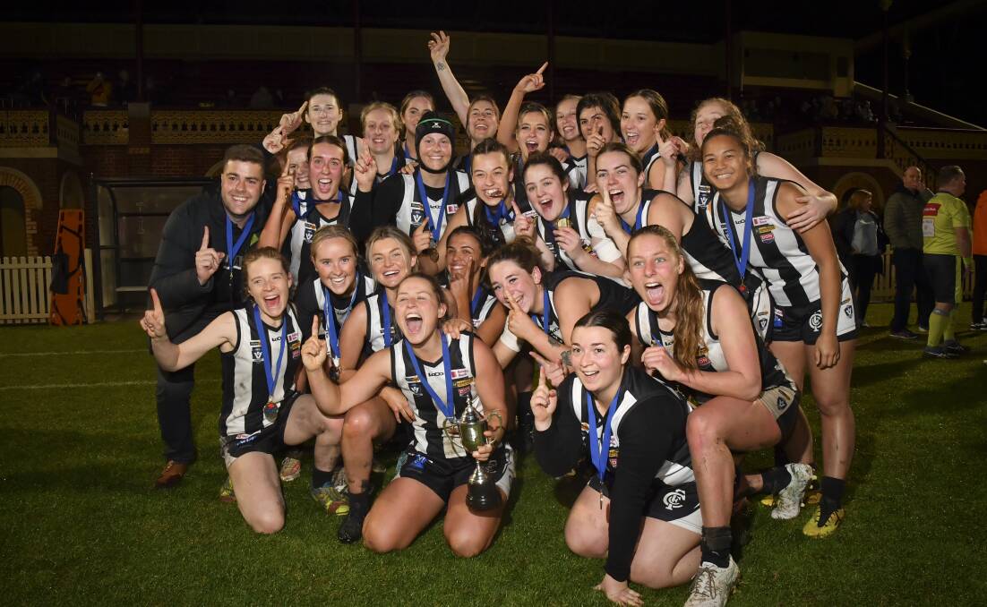 Castlemaine celebrates after winning the 2022 CVFLW premiership in a 19-point victory over Golden Square. Picture by Noni Hyett
