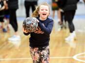 ALL SMILES: Young basketball players embraced the opportunity to learn from the Bendigo Braves at a clinic on Tuesday. Picture: DARREN HOWE