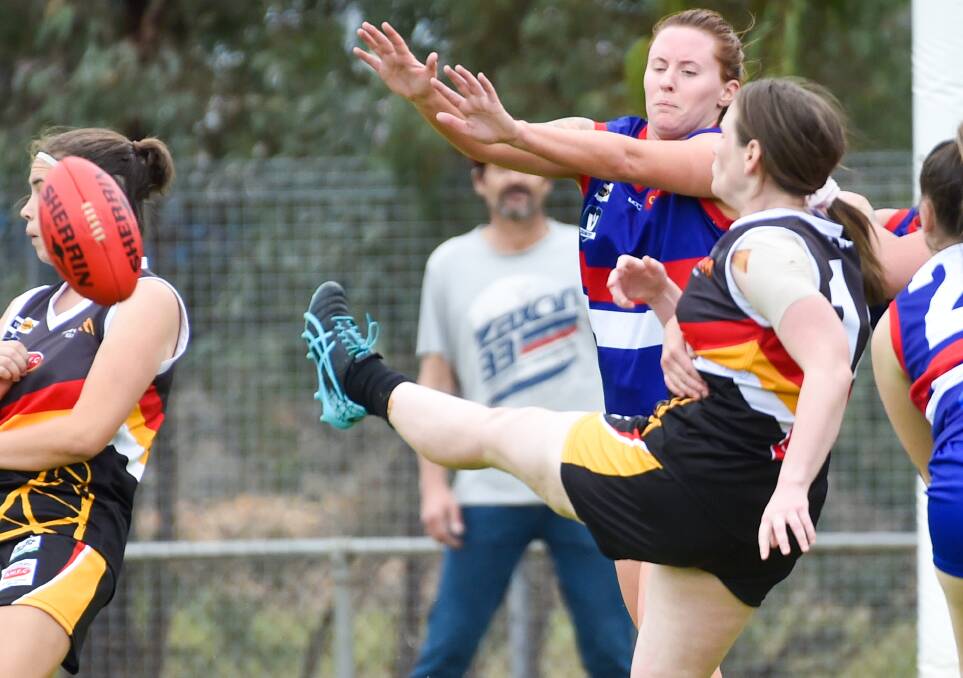DEFENSIVE STRENGTH: North Bendigo's Renne Brown applying defensive pressure on the Thunder during the second round of the 2021 CVFLW season. Picture: DARREN HOWE