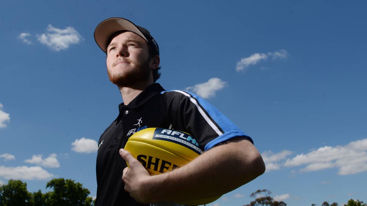 BORN TO COACH: Austin Stubbs is living his dream and is well on his way to achieve his ultimate goal of coaching in the AFL. Picture: DARREN HOWE
