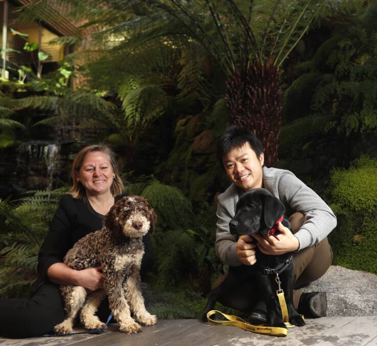 Dr Pauleen Bennett with Errol and Jimmy Mai with Abbie. Picture: GLENN DANIELS