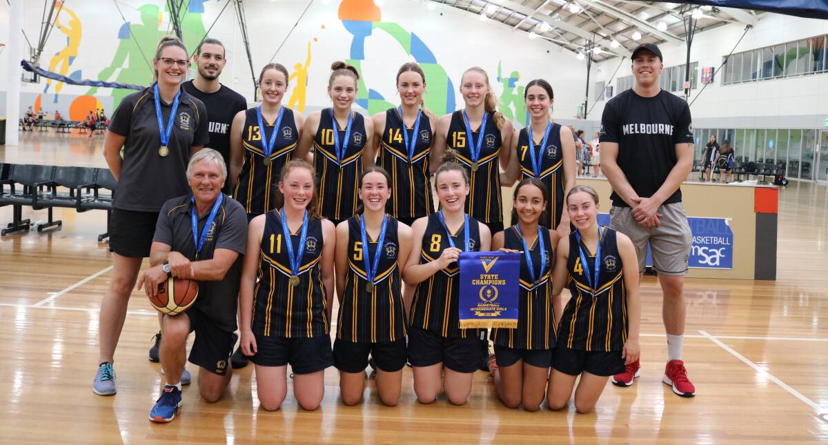 SOLID WIN: The Catherine McAuley College intermediate girls basketball team outperformed their rivals to be crowned as state champions.