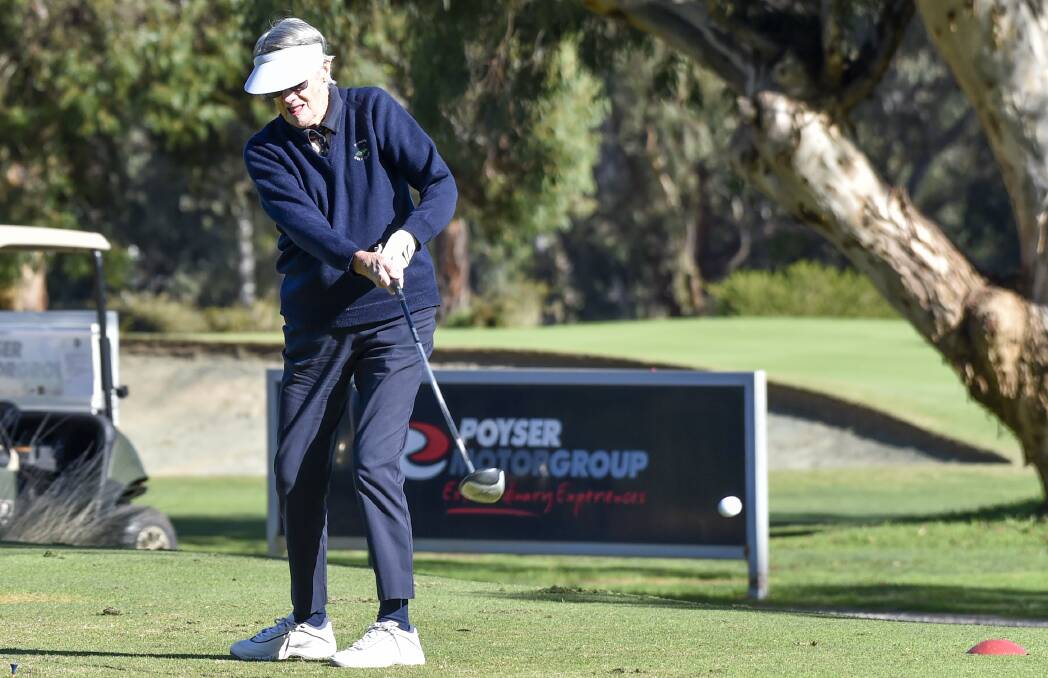 DOWN THE MIDDLE: Bendigo Golf Club member Betty Hanley hits her tee shot off the par-four first hole straight down the centre of the fairway. Picture: DARREN HOWE