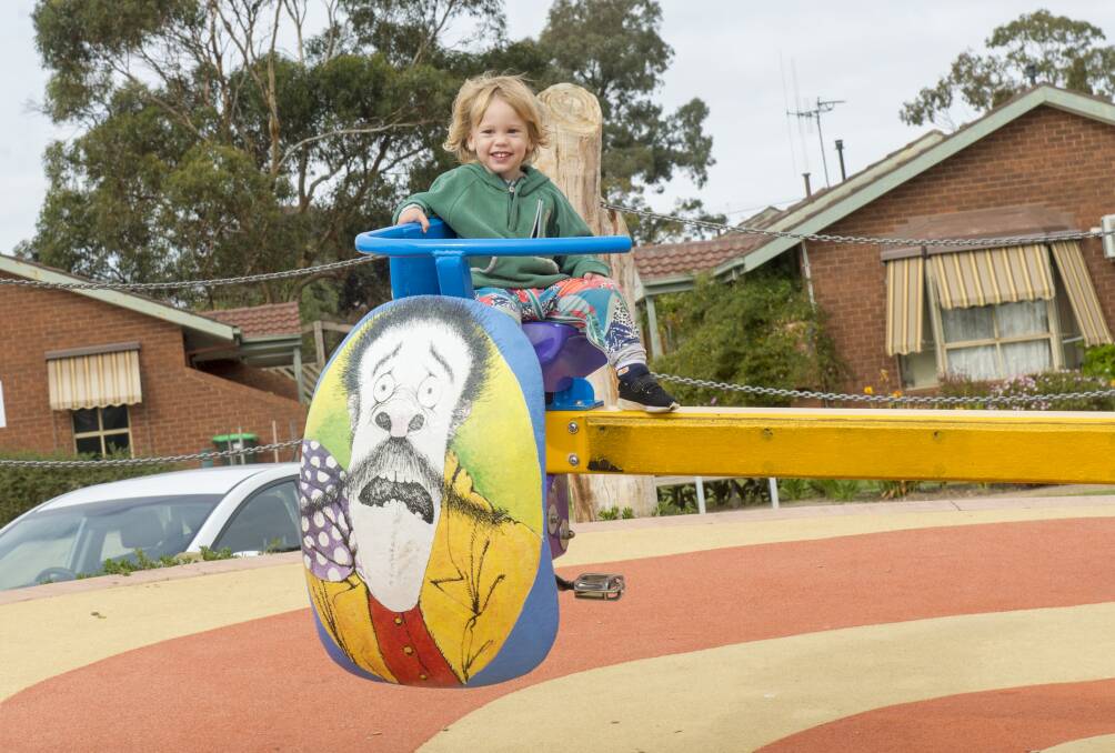 PLAYTIME: Flynn Lougoon having fun at the play space at Lake Neangar. Picture: DARREN HOWE