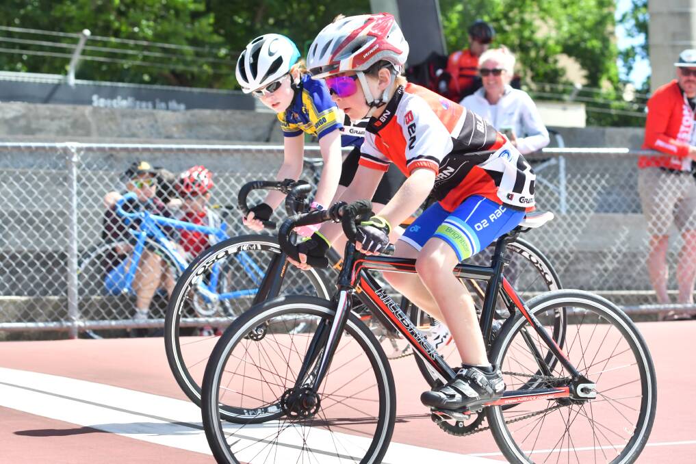 WHEEL TO WHEEL: Junior cyclists in the under-11 scratch race gave their best efforts on the track on Monday morning at the Bendigo and District Cycling Club's Christmas Carnival. Picture: NONI HYETT