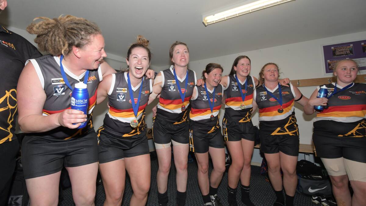 Bendigo Thunder players celebrate their win over Strathfieldsaye to be crowned inaugural Central Victorian Football League Women’s premiers. Picture: NONI HYETT