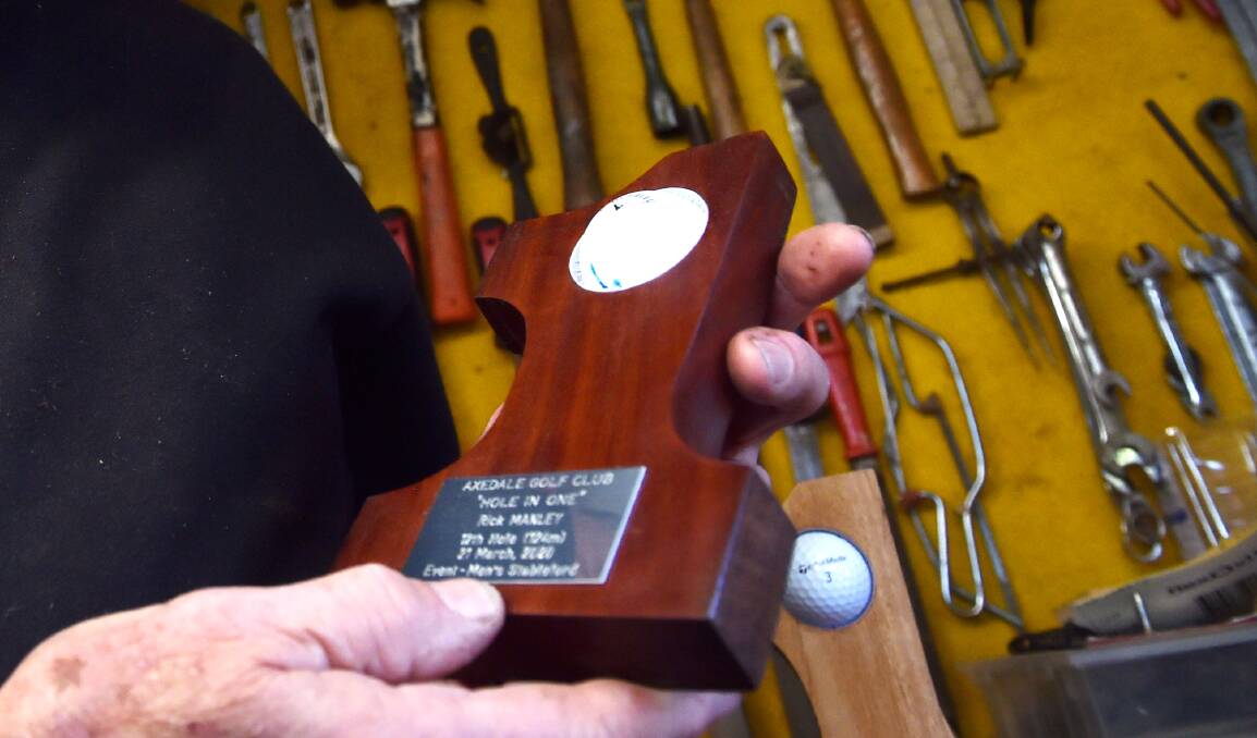MEMENTO: The handmade trophies are crafted from fallen trees located across the Axedale Golf Club.