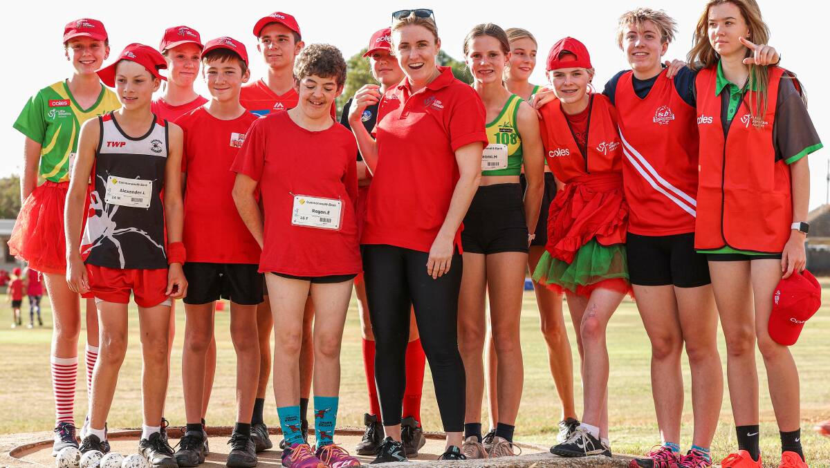 INSPIRING: Sally Pearson OAM visited Maryborough Little Athletics to meet the next generation of track and field stars. Picture: MARTIN KEEP