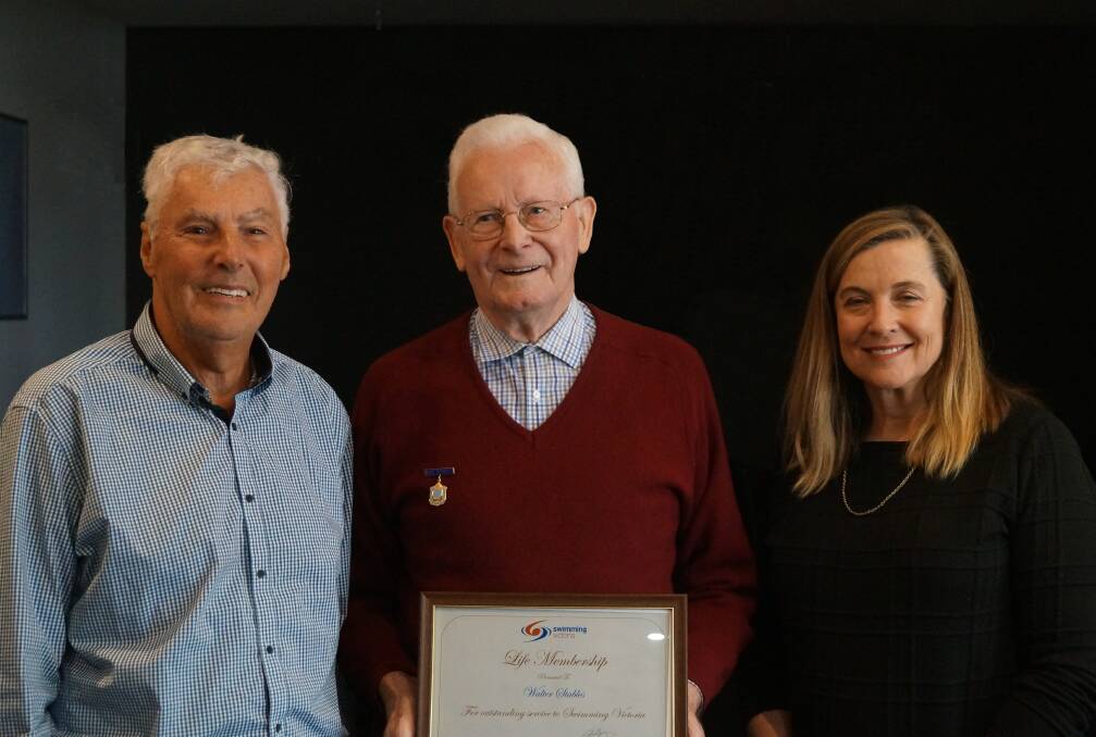 LIFE MEMBER: Wally Stables (centre) with fellow life member Don Alchin (left) and Swimming Victoria board president Susan Smith (right).