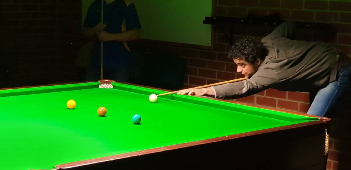 LINE EM' UP: Castlemaine's Pearse Casey during the BBSA snooker preliminary final. Picture: SUPPLIED