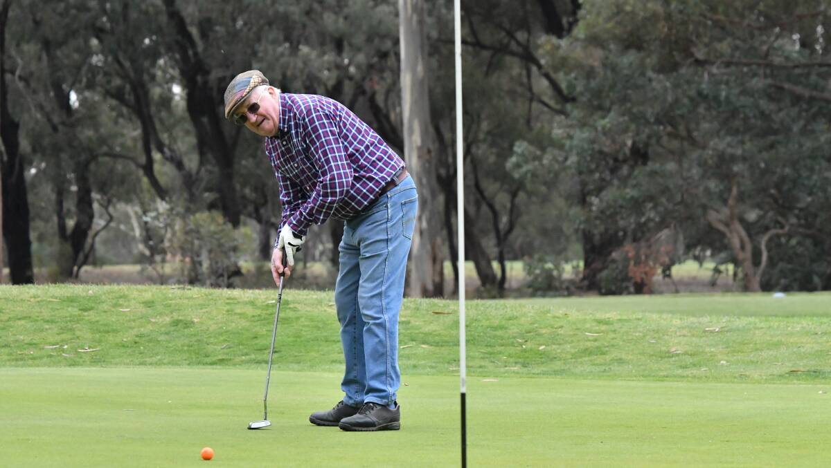 RIGHT TO LEFT: Neangar Park member Alan Threlfall makes a medium-range putt on the par-three third during a practice round on Tuesday morning. Picture: NONI HYETT