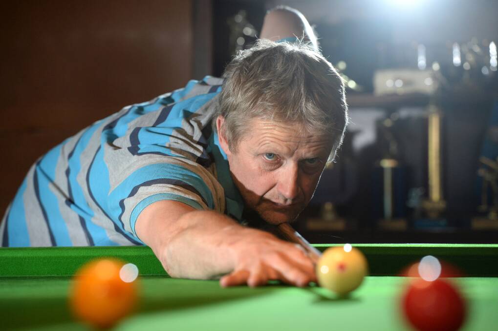 LINE EM' UP: Bendigo billiards player John Schenck has been involved with the game for more than 42 years. Picture: JIM ALDERSEY