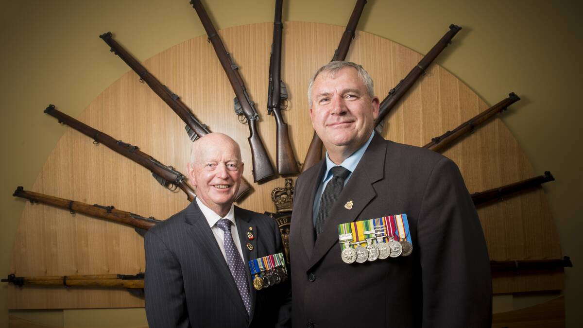 NEW LEADERSHIP: Former Bendigo District RSL president Cliff Richards with the new president Peter Swandale. Picture: DARREN HOWE