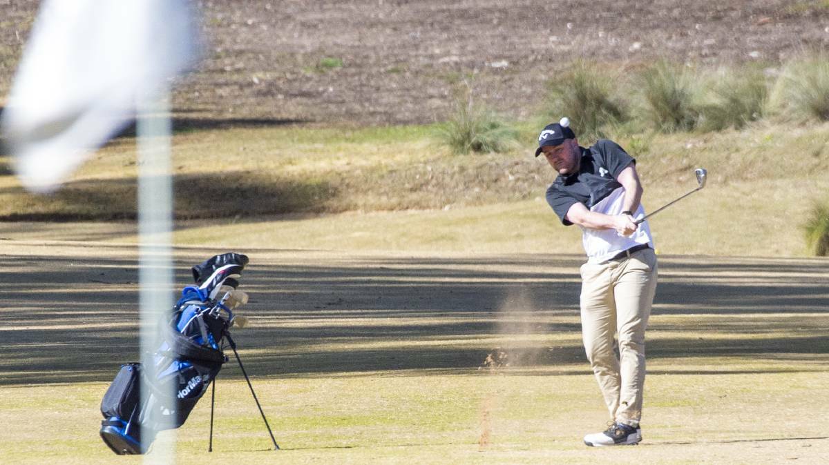 MASK FREE: Neangar Park golfer Lachy Begg enjoying a round of golf without a mask on Saturday before new rules came into effect on Monday. Picture: NONI HYETT