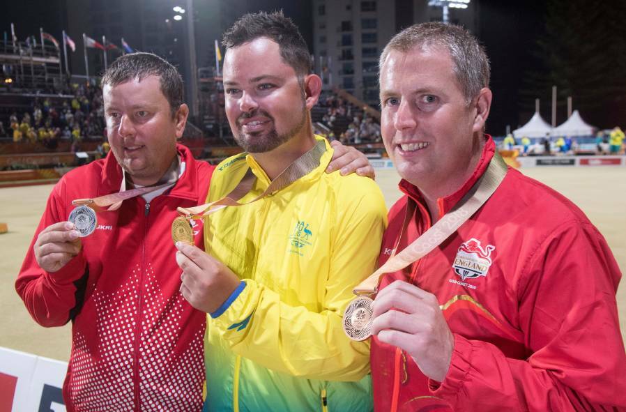 Bendigo's Aaron Wilson with his 2018 Gold Coast Commonwealth Games medal alongside Ryan Bester (silver) and Robert Paxton (bronze).