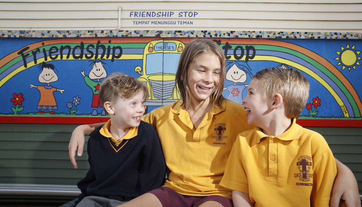 FRIENDSHIP: Ned, Baxter Jackson and Cooper Baker at the Friendship Stop, a place for students to make new connections within the school grounds. Picture: GLENN DANIELS