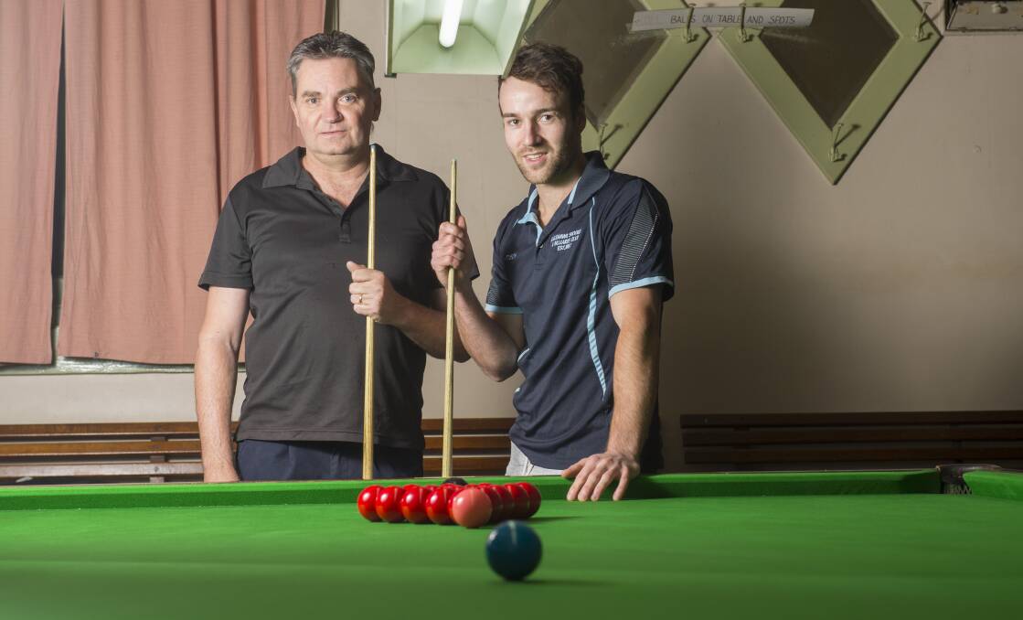CHAMPIONSHIP BATTLE: Tyson Howie (right) and Glenn Purdy (left) went head-to-head in the A-grade Bendigo snooker championship. Picture: DARREN HOWE 
