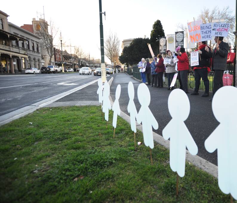 RALLY: Rural Australians for Refugees Bendigo Branch at a monthly rally held on View Street. Picture: NONI HYETT