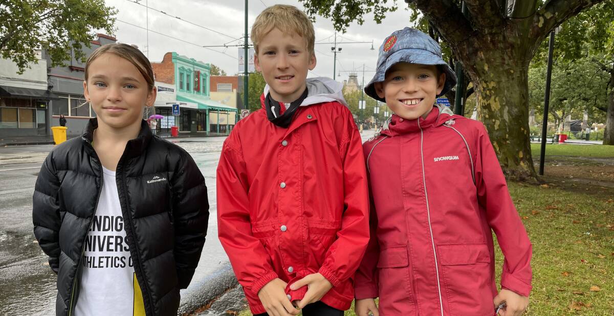 HEARTBREAK: Junior runners April Wainwright, Hugh Casey and Quinn Casey were all primed and ready to compete in the 2022 Dragon Mile. Picture: ANTHONY PINDA