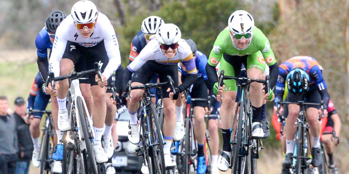 ROAD WARRIOR: Dylan McKenna, middle, on his way to victory in the three-day tour. Picture: DARREN HOWE