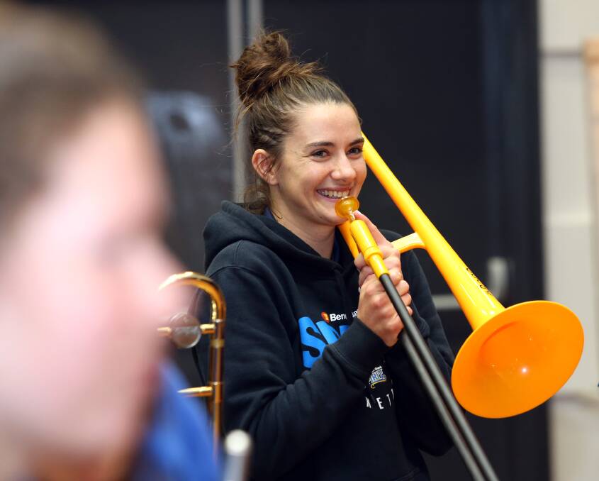 Tessa Lavey traded the basketball for a trombone at a recent practice session. Picture: GLENN DANIELDS