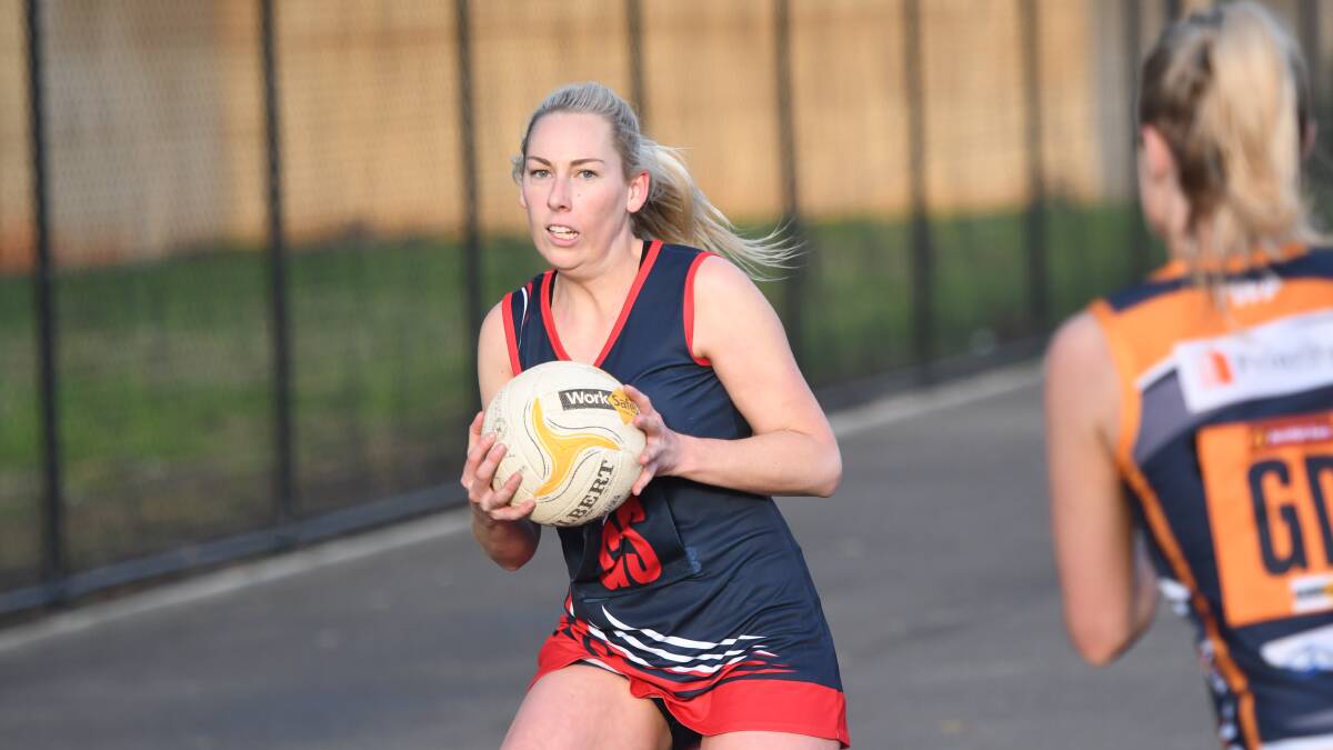 SOLID VICTORY: Calivil United goal shooter Kellie Brunker during the Demons comfortable 26-goal win over the Eagles. Pictures: ANTHONY PINDA
